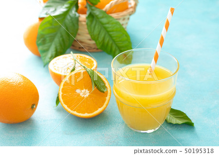 Orange freshly squeezed juice in glass and fresh Orange freshly squeezed juice in glass and fresh 50195318