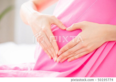 pregnant woman show love gesture pregnant woman show love gesture 50195774