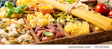 Assorted colorful italian pasta in wooden box 50195908