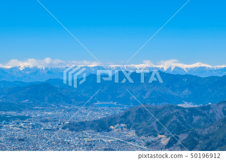 Fujiyoshida town and mountains in the Southern Alps (from the top of Mt. Kashiyama) 50196912