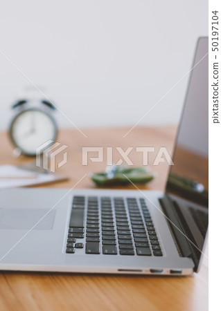 Freelance workplace with laptop Freelance workplace with laptop 50197104