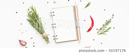 Blank notepad pages with greens herbs and spices Blank notepad pages with greens herbs and spices 50197176