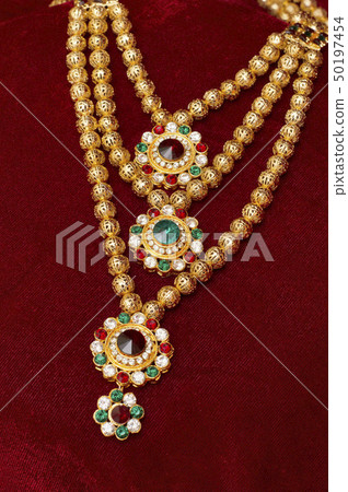 Multi layered artificial golden rani haar jewelry 50197454