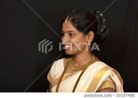 Young girl in traditional Kerala saree and jewelry 50197486