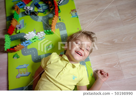 A Creative kindergarten kids build a block tower. A Creative kindergarten kids build a block tower. 50198990