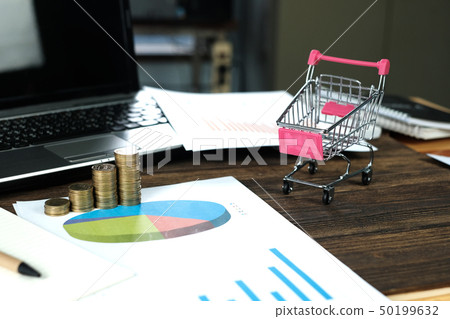 Step of coins stacks with trolley and notebook Step of coins stacks with trolley and notebook 50199632