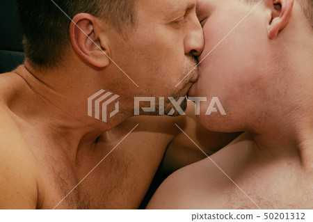 Two guys are kissing. Love and relationships Two guys are kissing. Love and relationships 50201312