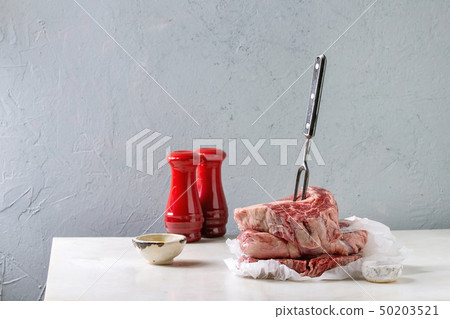 Raw beef steaks 50203521