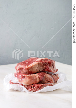 Raw beef steaks 50203522