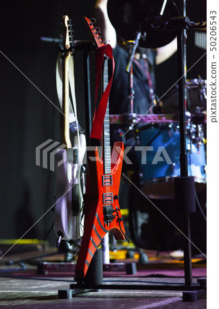 retro guitars in stage lights 50206543