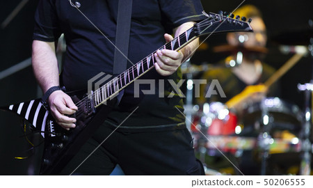 guitarist on stage during concert 50206555