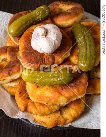 Belyashi, Tomatoes, Pickled cucumbers, Garlic, Vodka glass 50206576