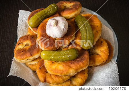 Belyashi, Tomatoes, Pickled cucumbers, Garlic, Vodka glass 50206578