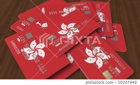 Pile of credit cards with flag of Hong Kong. Banking system conceptual 3D rendering 50207849
