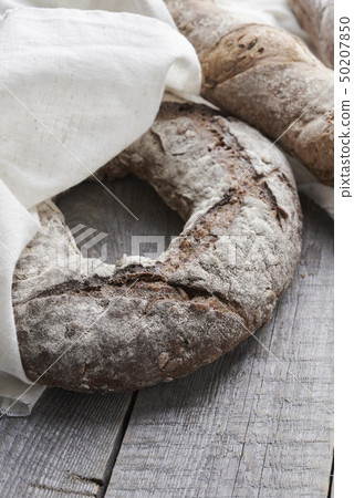 verios bread on wooden background 50207850