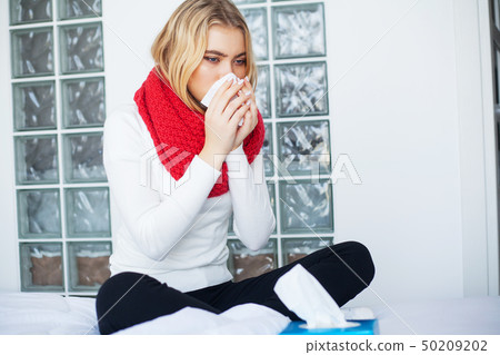 Flu. Woman Suffering From Cold Lying In Bed 50209202