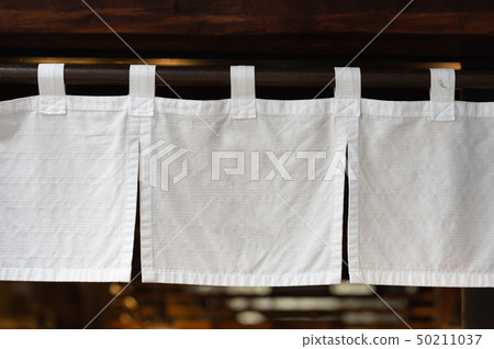 The curtain-like fabric that hangs in front of 50211037