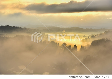 Niigata Matsushiro Hoshiya Tanada with morning sun and fog and snow 50214757