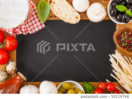 Charcoal wooden menu board with homemade spaghetti Charcoal wooden menu board with homemade spaghetti 50219748