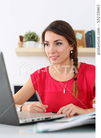 Beautiful smiling female student Beautiful smiling female student 50219965