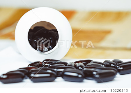pills scattered on the table pills scattered on the table 50220343