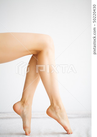 Beautiful Soft Skin. Closeup Of Long Woman Legs With Perfect Hairless Smooth And Silky Skin. Hair 50220430