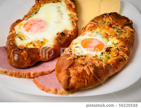 Adjar khachapuri with egg Adjar khachapuri with egg 50220588