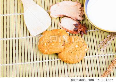 cereal cookies milk in bowl Cornflakes spices cereal cookies milk in bowl Cornflakes spices 50221827