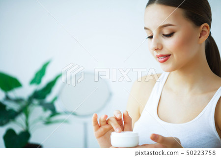 Beauty and Care. Portrait of a Young Girl with Pure Skin. Beauti Beauty and Care. Portrait of a Young Girl with Pure Skin. Beauti 50223758