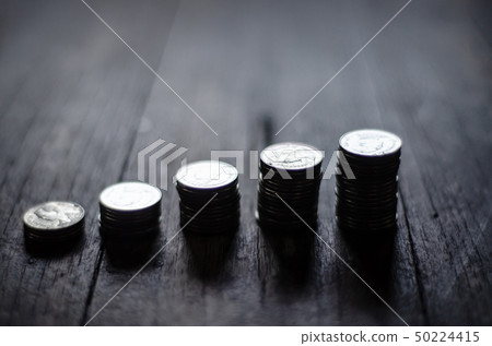 Coins placed in rows . 50224415