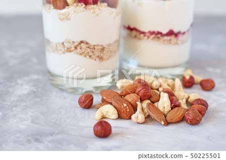 granola with raspberries, oatmeal flakes and nuts granola with raspberries, oatmeal flakes and nuts 50225501