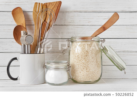 Kitchen tools and glass jar with rice Kitchen tools and glass jar with rice 50226852