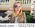 young woman in city 50227974