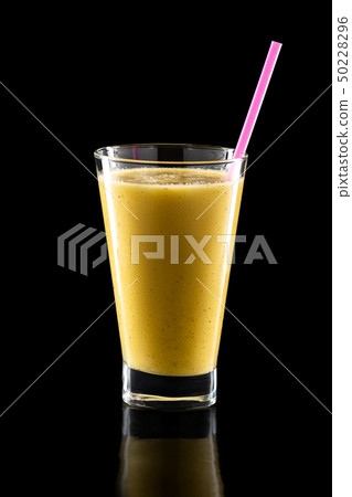 Glass of fresh cold smoothies with straw isolated Glass of fresh cold smoothies with straw isolated 50228296