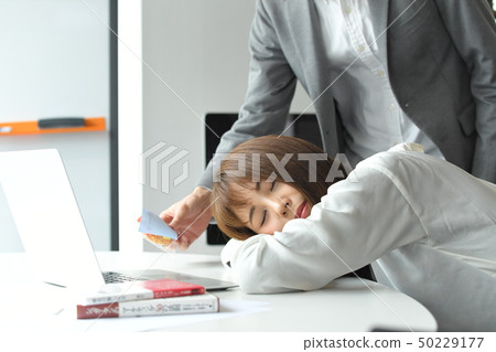 Co-worker office work tired snoozing 50229177