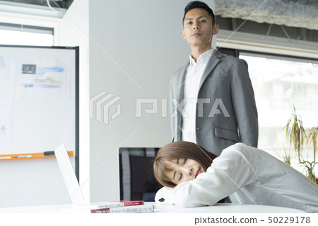 Co-worker office work tired snoozing 50229178