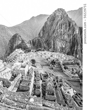 Machu Picchu - lost city of Incas. Historical citadel above Sacred Valley with Urubamba River in Machu Picchu - lost city of Incas. Historical citadel above Sacred Valley with Urubamba River in 50229731