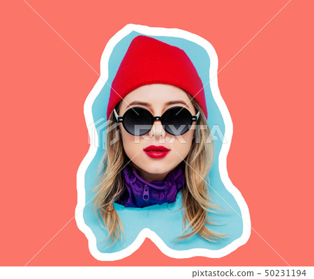 Head of a young style girl in cap and sunglasses on blue and living coral color background Head of a young style girl in cap and sunglasses on blue and living coral color background 50231194
