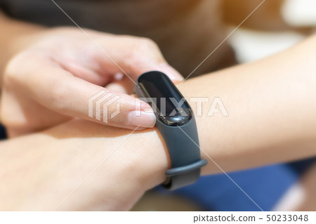 Close up image hand of male using smart watch Close up image hand of male using smart watch 50233048