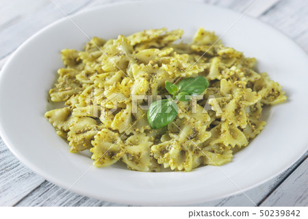 Portion of farfalle with pesto 50239842