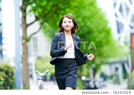 Running business woman 50241029