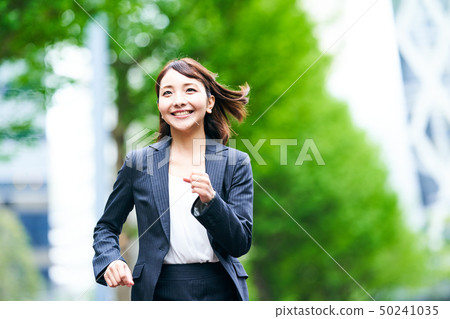 Running business woman Running business woman 50241035