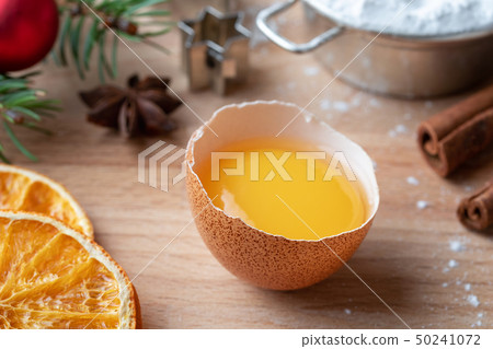 Fresh egg yolk and other ingredients for Christmas Fresh egg yolk and other ingredients for Christmas 50241072