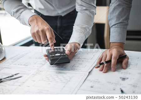 Construction engineering or architect discussing a 50243130