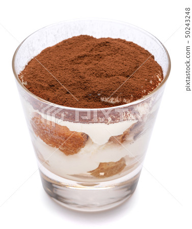 Classic tiramisu dessert in a glass isolated on a white background with clipping path Classic tiramisu dessert in a glass isolated on a white background with clipping path 50243248