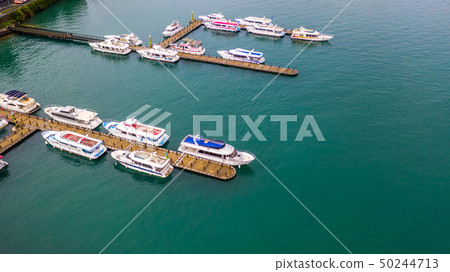 Boats in the harbor at Sun Moon Lake, Shuishe Pier Boats in the harbor at Sun Moon Lake, Shuishe Pier 50244713