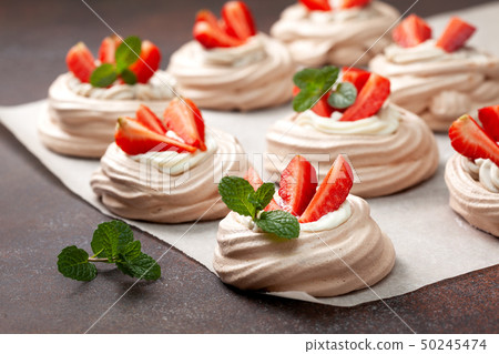 pavlova cake with strawberries 50245474
