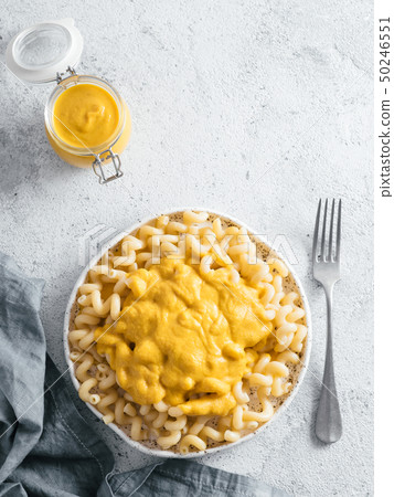 Pasta with vegan creamy chia cheddar sauce Pasta with vegan creamy chia cheddar sauce 50246551