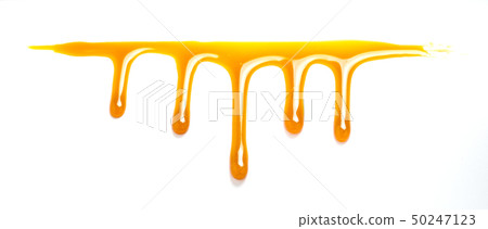 Flow down honey isolated on white 50247123