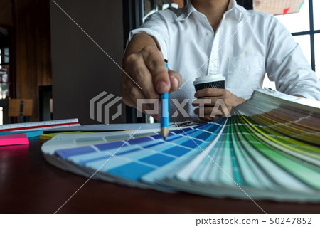 Graphic designer choose color bands samples. Graphic designer choose color bands samples. 50247852